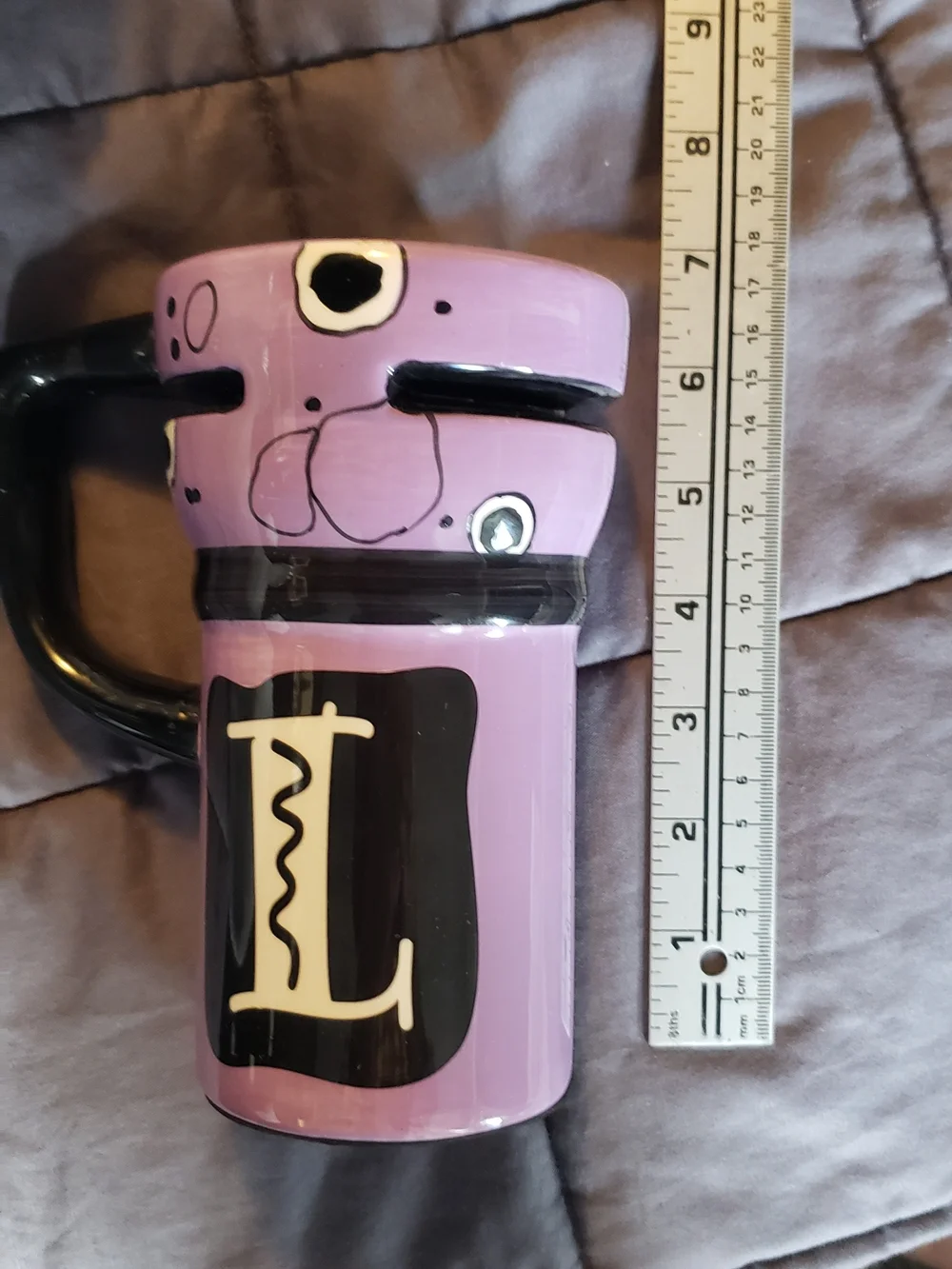 Lavender Ceramic Travel Mug with Playful Face and Black Accents Monogram L